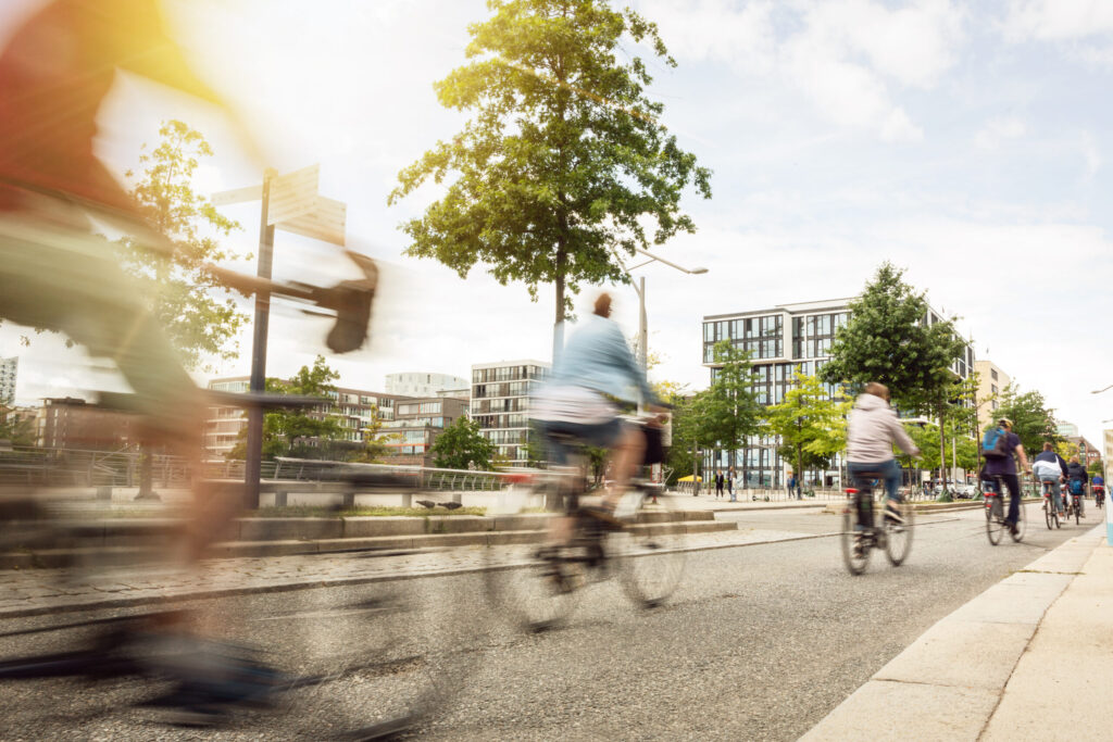 A group of moving cyclists in the city